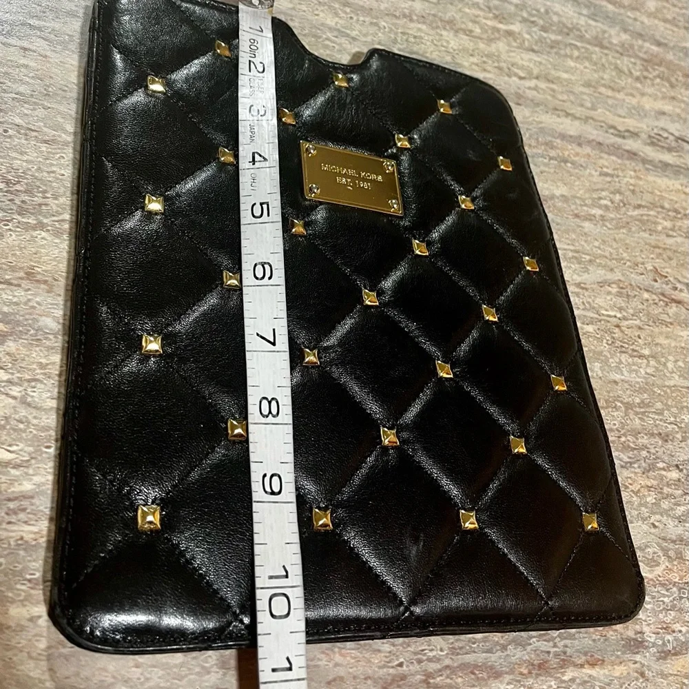 Michael Kors quilted tablet cover with gold color studs